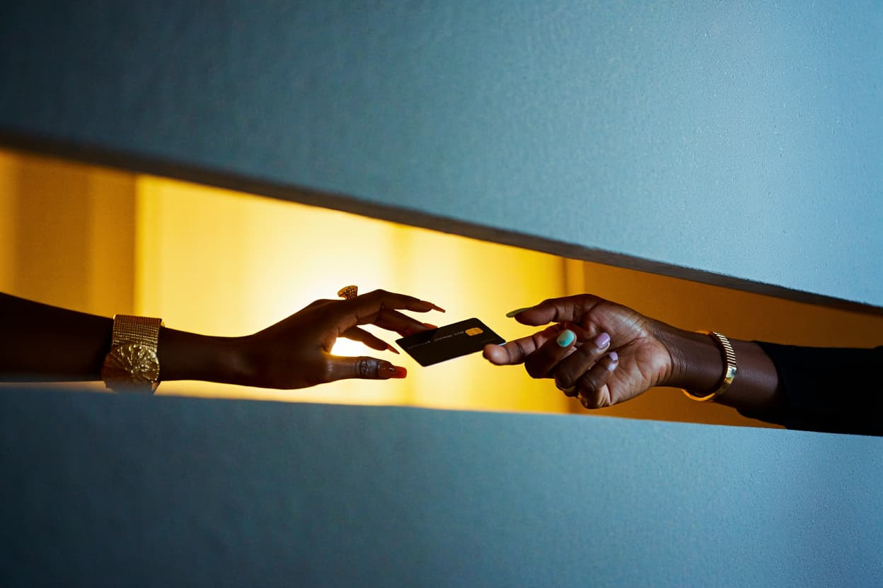 Passing a payment card between hands